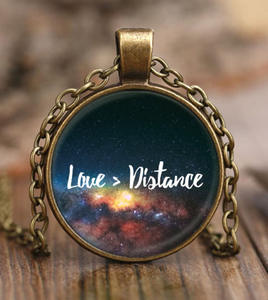 long-distance gifts for boyfriend | love is greater than distance pendant necklace