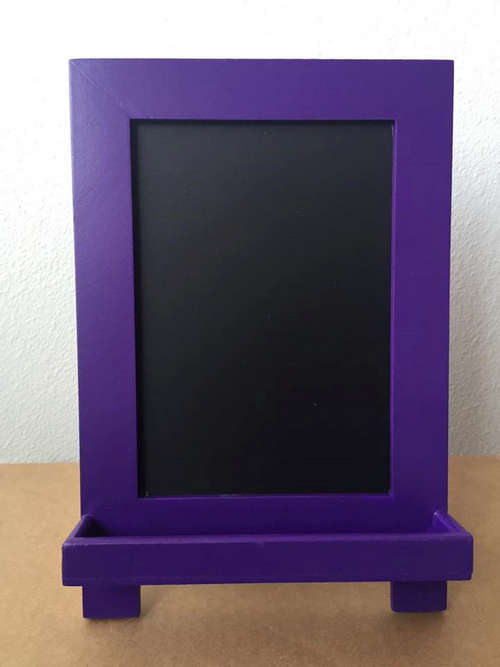 office chalkboard with purple frame