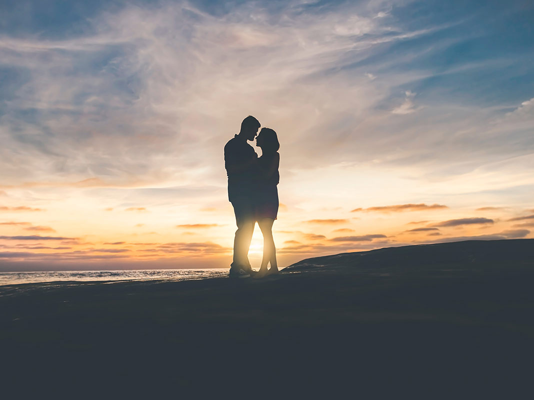 long distance couple hugging