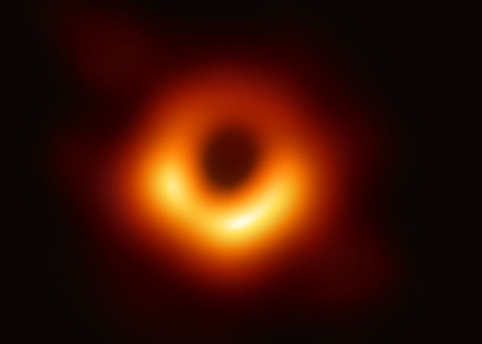 the first image of a black hole was released in 2019 and the black hole isn't pitch dark. In fact, it is surrounded by light trapped by the black hole.